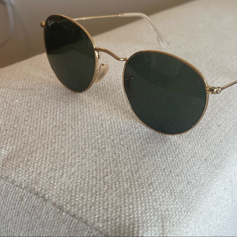 Ray-Ban Round gold rimed sunglasses